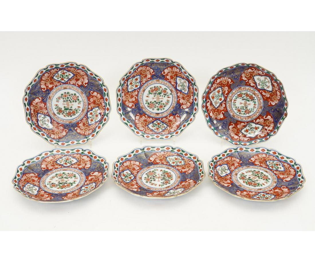 SET OF IMARI OCTAGONAL PLATES: Set of six colorful Imari octagonal shaped plates signed. 1.5"h x 9.75" each