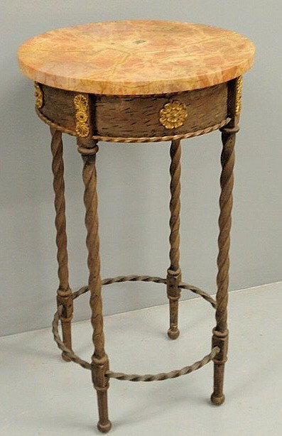 French iron table with a round marble top and doré: French iron table with a round marble top and doré decoration. 32"h., top 17.5"dia.