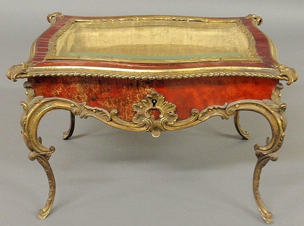 Fine French tortoiseshell and doré bronze miniatur: Fine French tortoiseshell and doré bronze miniature curio cabinet, c.1870, with a hinged beveled glass top. 10"h.x15.5"w.x11.5"d.