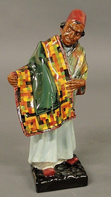 Royal Doulton figure “Carpet Seller”. 9”h.