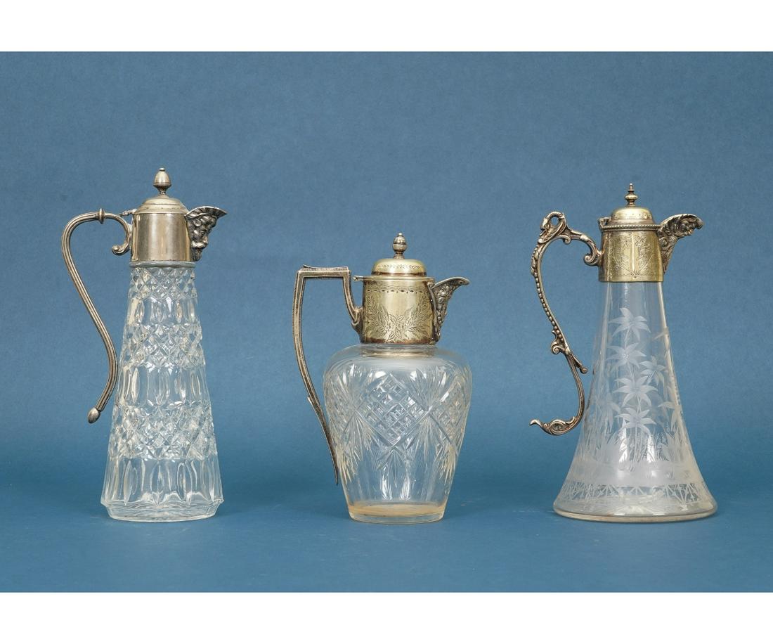 THREE SILVERPLATE CLARET JUGS (1 of 8)