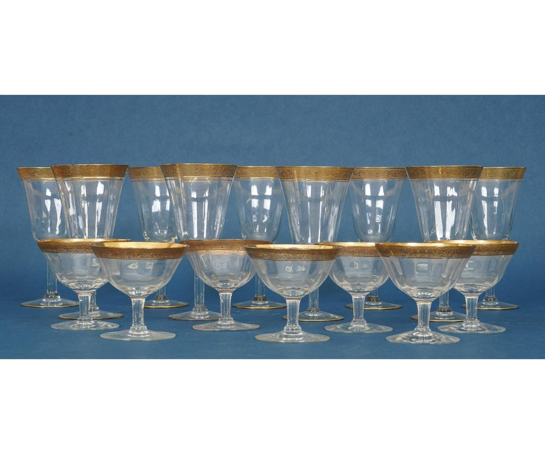 NINE GILT RIMMED GOBLETS: Nine gilt rimmed goblets, circa 1920,; together with seven matching sherbets. Tallest: 6.75"h x 3.5"dia Shortest: 3.5"h x 3.75"dia