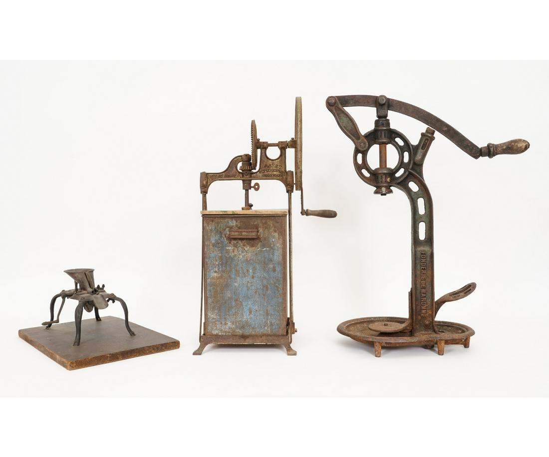 DAZEY THREE-GALLON CHURN: Dazey three-gallon churn; together with a cherry pitter, pat. 1883, and an iron wine bottle corker. Largest: 26.5"h x 11"w x 22"d
