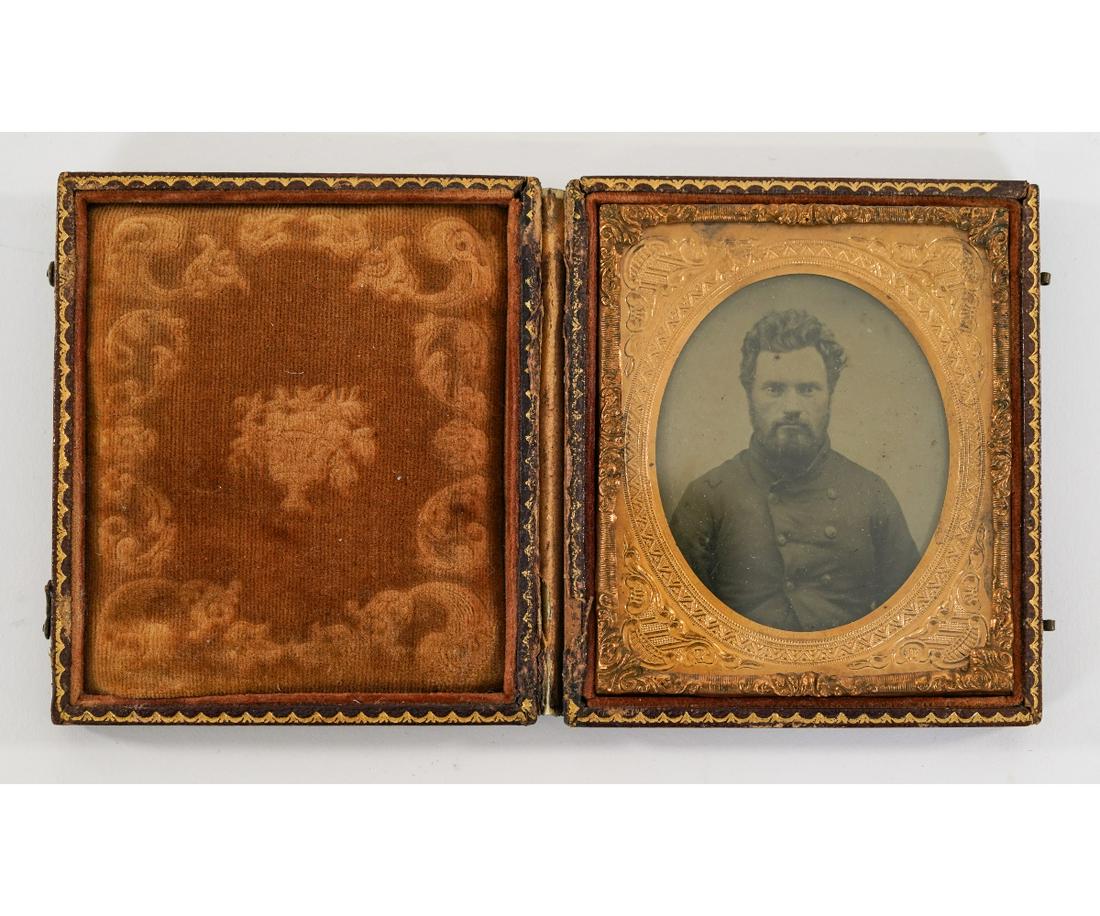 CIVIL WAR SOLDIER AMBROTYPE: Ambrotype of Civil War soldier, mounted in a felt lined period case. 3.75" x 3.25"