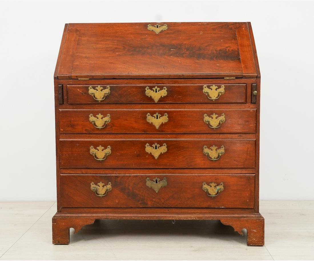 PENNSYLVANIA SLANT LID DESK: Pennsylvania walnut slant lid desk, circa 1770, with document drawered interior. 43"h x 38"w x 21"d