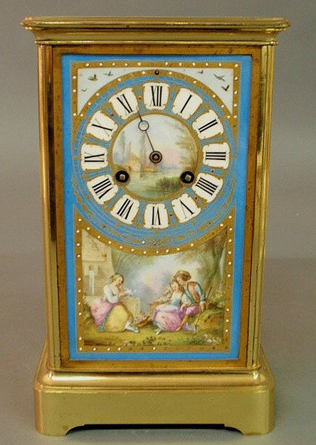French brass carriage clock, 19th c., the colorful: - French brass carriage clock, 19th c., the colorful porcelain insets to sides and front with romantic vignettes and landscape scenes. 11”h.x7”w.x5”d.