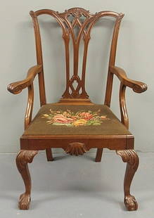 Centennial Chippendale style mahogany open armcha: Centennial Chippendale style mahogany open armchair with floral needlepoint seat. 40.5"h.x23"w.x18.5"d., seat 18"h.