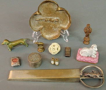 Group of miscellaneous table articles including a: Group of miscellaneous table articles including an Asian carved ivory ball, brass ashtray with raised relief fox, presentation shears, etc.
