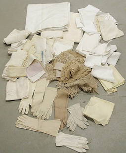 Box lot of table linens to include some tableclot: Box lot of table linens to include some tablecloths, mostly napkins, some tatting and crochet work, and seven pair of ladies gloves.