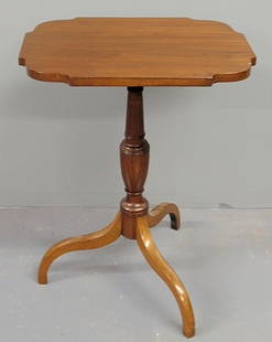New England cherry candlestand, c.1800, with a sh: New England cherry candlestand, c.1800, with a shaped top and spider legs. 29"h., top 22"x16.75