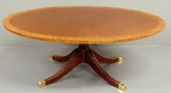 Inlaid mahogany oval Duncan Phyfe style coffee ta: Inlaid mahogany oval Duncan Phyfe style coffee table by Kindel. 17.75"h., top 30.25"x48