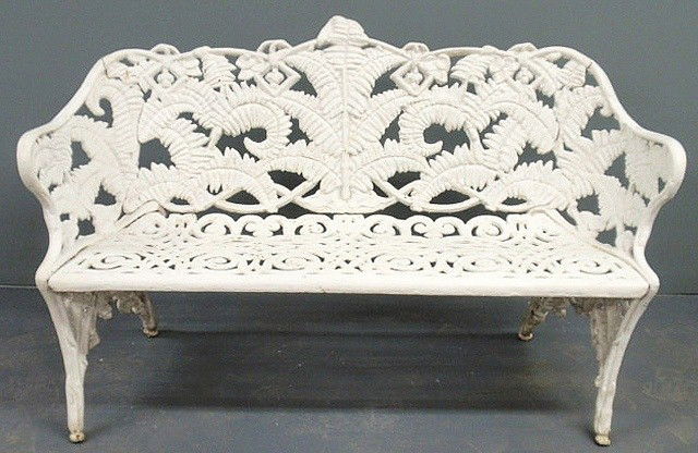 Victorian white painted cast iron bench in a fern: Victorian white painted cast iron bench in a fern design. 33"h.x54"w.x21"d., seat 16"h.