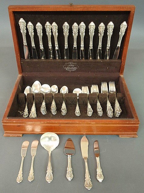 Sterling silver flatware service by Wallace, "Sir: Sterling silver flatware service by Wallace, "Sir Christopher" pattern 1936, to include: 12 each dinner forks 7.25", salad forks 6.25", teaspoons 6", dinner knives w/stainless blades 9.75", 8 soup spo