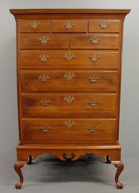 Chippendale walnut chest-on-frame, the upper sect: Chippendale walnut chest-on-frame, the upper section c.1780, with a molded cornice above a three-over-two-over four drawer configuration all resting on a base of a later date with drake feet. 67"h.x41