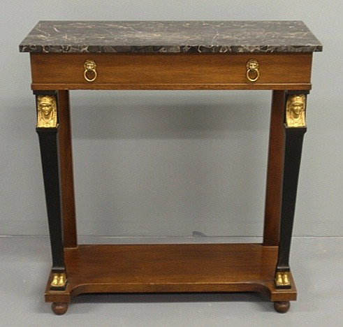 Empire style mahogany pier table with a marble to: Empire style mahogany pier table with a marble top. 32"h.x30"w.x12"d.