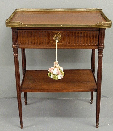 French Empire style mahogany end table with a bra: French Empire style mahogany end table with a brass galleried tray top, early 20th c. 26"h.x20.5"w.x13.5"d.