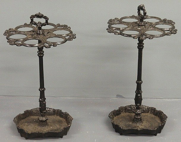 Two similar Victorian cast iron umbrella stands.: Two similar Victorian cast iron umbrella stands. Tallest 27"h.x14"dia.