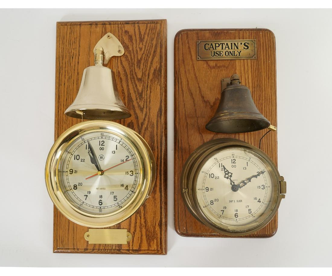 TWO OAK SHIPS CLOCKS: Two oak mounted ships clocks, both quartz operated. Largest 20.5"h x 10"w x 7"d