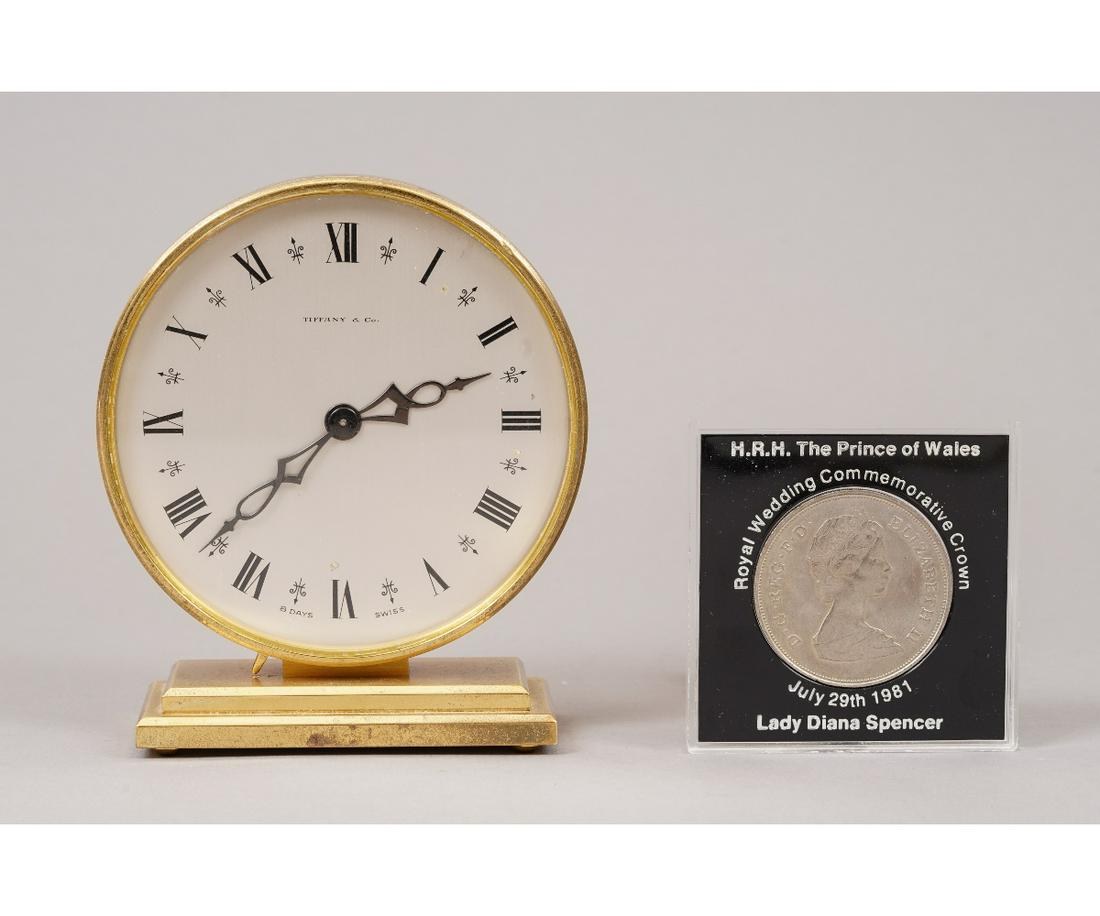 TIFFANY & CO. DESK CLOCK: Tiffany & Co. desk clock by Concord Watch Co., Swiss, 4.25"h x 3.75"dia; together with a Royal Wedding Commemorative British Crown coin, 1.5"dia