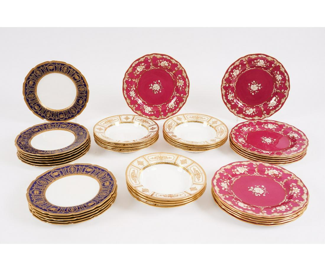 TWELVE SPODE DESSERT PLATES: Twelve Spode bone china dessert plates, red with white and gilt decoration, 9"dia; together with twelve Royal Doulton plates, 8.75"dia, and twelve Minton bowls, 7.75"dia.