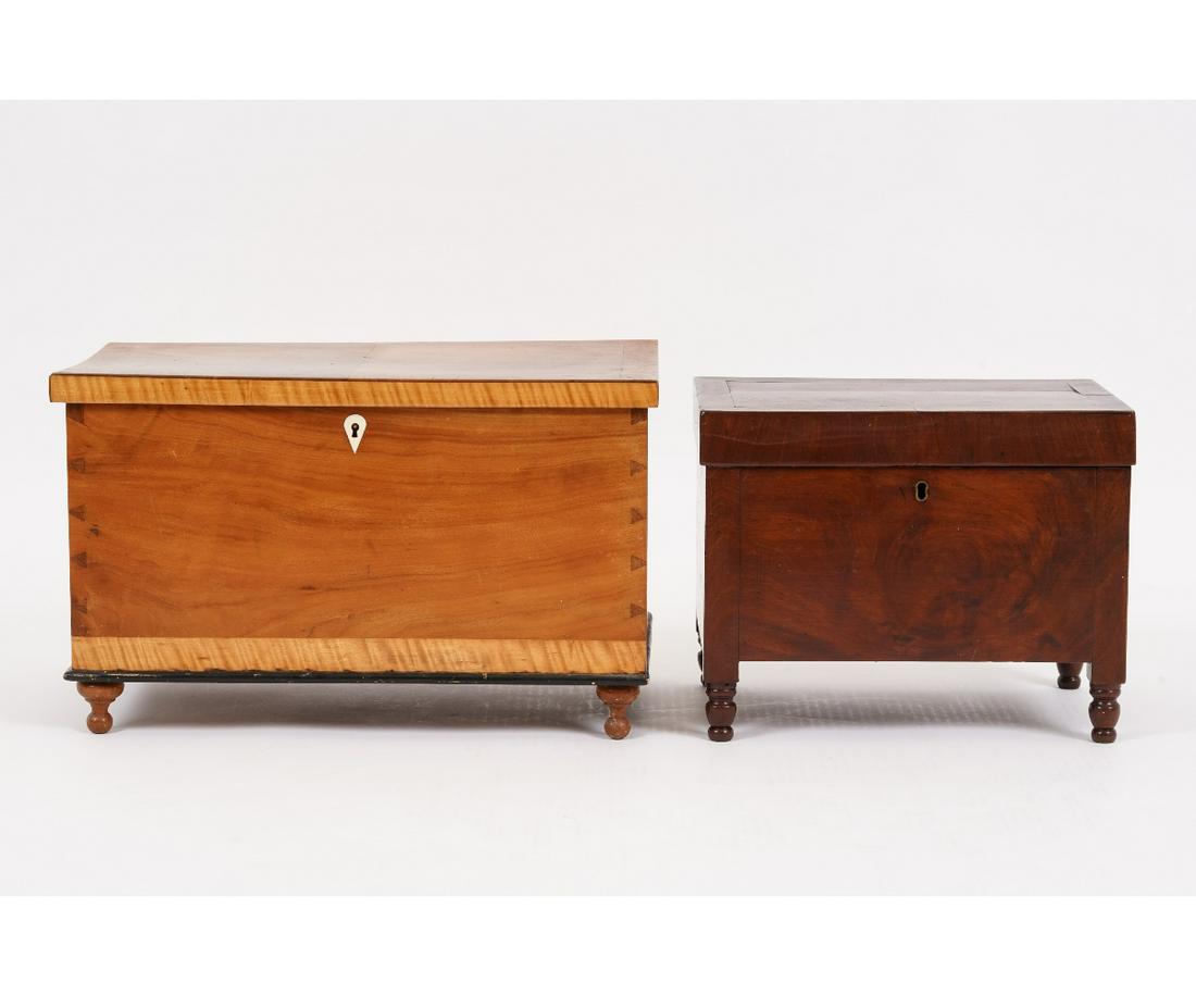 TWO WOODEN BOXES: Two wooden boxes the largest a cherry storage box with maple banding, 19th c.; together with a mahogany veneered box. Largest: 9.75"h x 14.25"w x 8.5"d