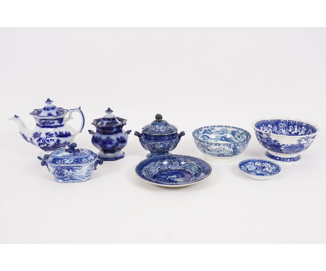 STAFFORDSHIRE BLUE TRANSFERWARE: Staffordshire blue transfer tableware, 19th c., to include bowls, covered sauce tureen, sugar bowl, flow blue coffee pot and sugar bowl etc. Teapot: 9"h x 10.75"w