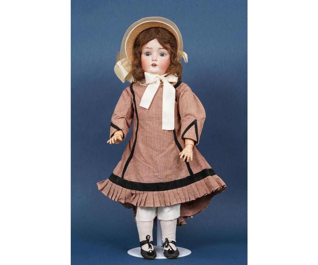 GERMAN BISQUE HEAD DOLL: German bisque head doll marked 264 with jointed composition body. 28.5"h