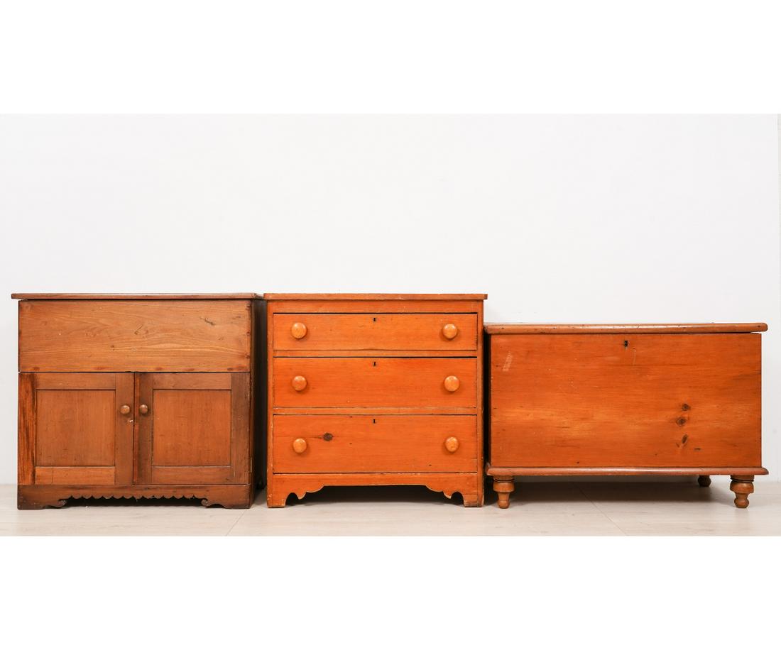 THREE PINE CHESTS: Three pine chests to include a lite lid commode, 29"h x 33"w x 16.5"d; a cottage bureau, 29"h x 30.5"w x 16"d, and a blanket chest, 24.75"h x 37"w x 18.5"d, all 19th c.