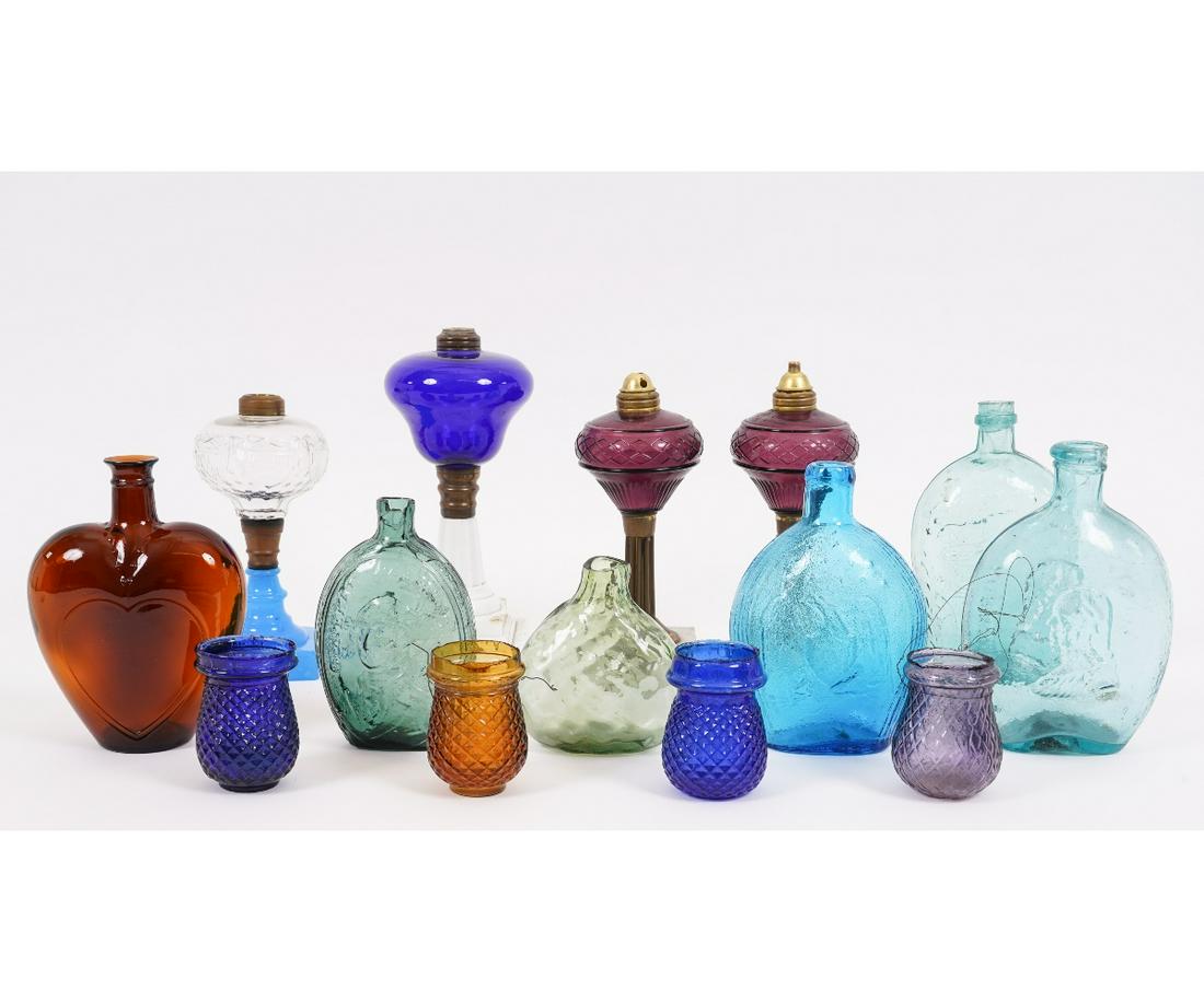 GLASS FLASKS: Collection of glass flasks of various colors, to include "Lockport Glassworks" (the largest), "The Union", "General Washington"; together with four oil lamps and four colored glass Christmas ornaments
