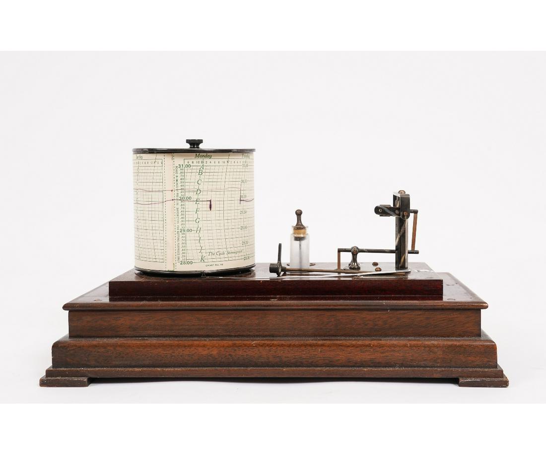 CASED CYCLO-STORMOGRAPH: Taylor Instrument Co. mahogany cased Cyclo-Stormograph weather barograph. 8"h x 13.5"w x 7.75"d