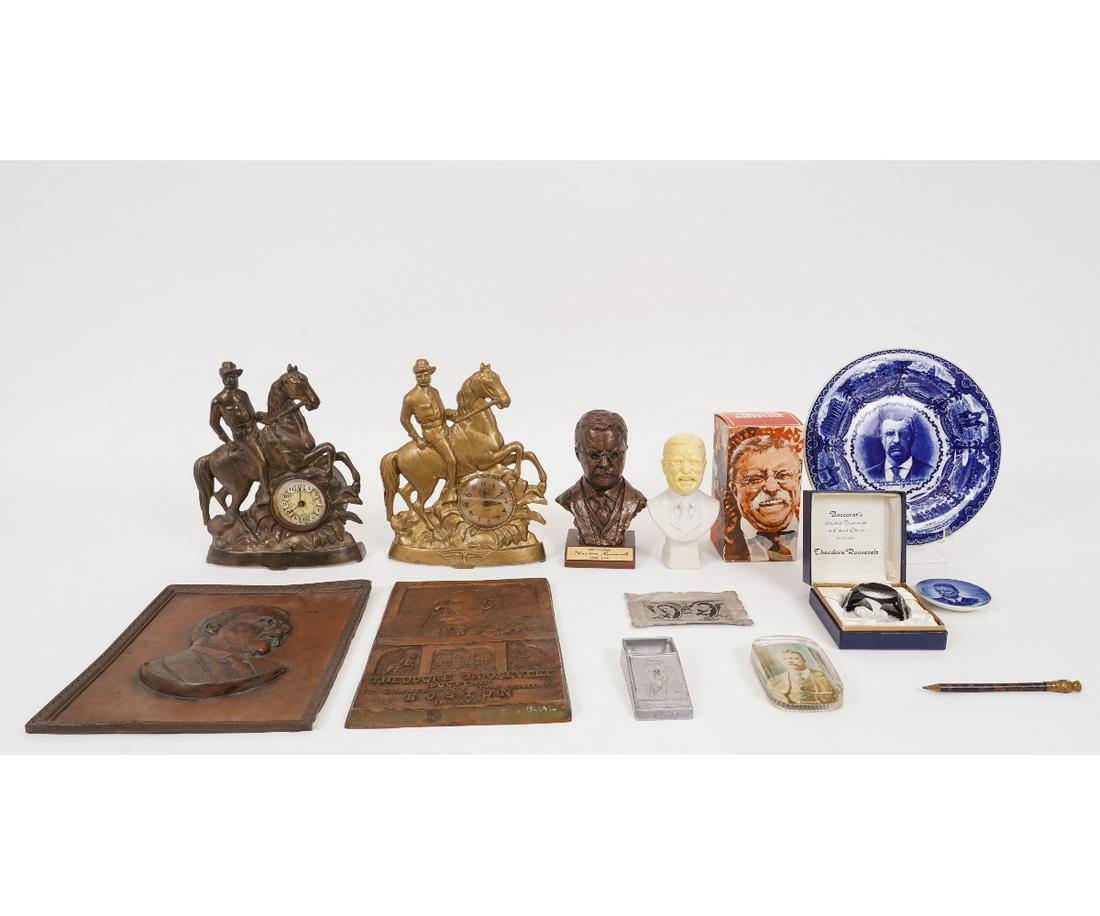 THEODORE ROOSEVELT SOUVENIR COLLECTION: Theodore Roosevelt souvenir collection to include; two bronze plaques, largest 11.5" x 9.25"; a baccarat paperweight; two cast metal clocks; a large Staffordshire blue plate etc.