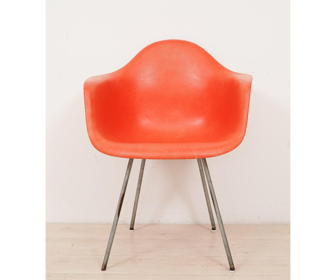 MID-CENTURY MODERN KNOLL CHAIR: Mid-century modern Knoll red/orange fiberglass armchair, no label. 31"h x 25"w