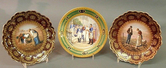 Two hand-painted Royal Vienna, Bavarian plates wi: Two hand-painted Royal Vienna, Bavarian plates with scenes of farm workers and an Austrian porcelain plate with a Napoleonic scene, all 9.5"dia.