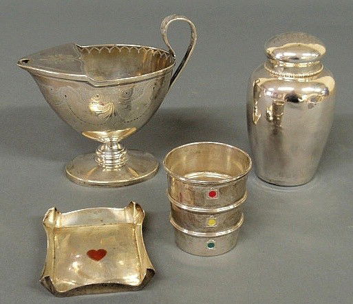 Four sterling silver items to include a Tiffany t: Four sterling silver items to include a Tiffany tray with a red enameled heart 3.5"x2.5", a Gorham "Stoplight Jigger" marked for 1, 2.5 & 3.5 oz., a Ford & Tupper sauce boat 3.75"h. and a small shaker