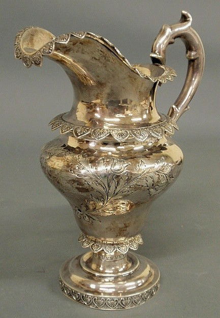 Coin silver presentation pitcher by E. Stebbins &: Coin silver presentation pitcher by E. Stebbins & Co., NY, finely chased and engraved "Presented to George B. Raymond, Master of the Ship Atalanta of New York for having nobly rescued the Officers, Pa
