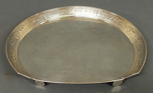 Gorham sterling silver highchair tray inscribed ": Gorham sterling silver highchair tray inscribed "Marshall Jewell Dodge from E.E. Jewell, Christmas 1877", the rim chased with horses and cherubs. 13"x15", 36 troy oz.
