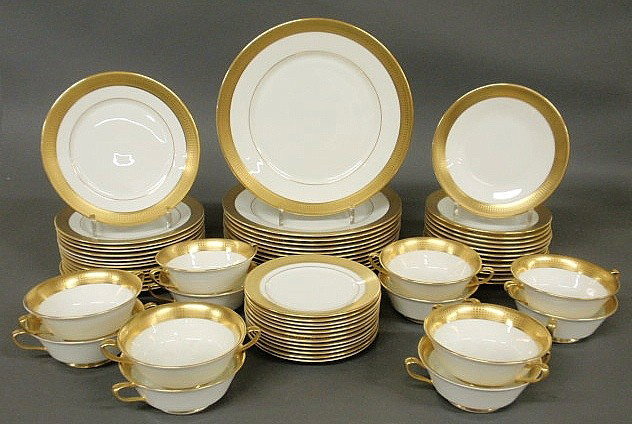 Contemporary Oxford bone china service, eggshell: Contemporary Oxford bone china service, eggshell with gilt banding to include: 12 bouillon cups 2"h.x5"dia., 12 dinner plates 10.75"dia., 14 luncheon plates 8"dia., 13 salad plates 7"dia., 12 plates 6