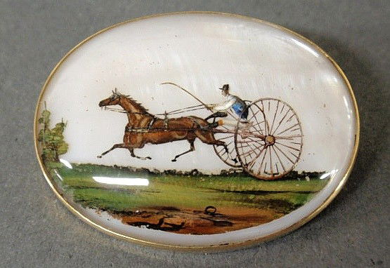 Reverse crystal intaglio brooch, 14k rose gold ba: Reverse crystal intaglio brooch, 14k rose gold backing, image of horse and sulky, approximately 25mm x 32mm overall size, 7.2dwt.