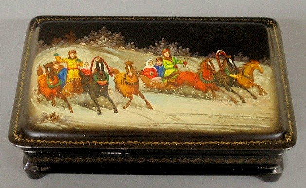 Finely decorated Russian lacquerware box, c.1880,: Finely decorated Russian lacquerware box, c.1880, decorated with sledding scene and horses. 5"h.x8.5"w.