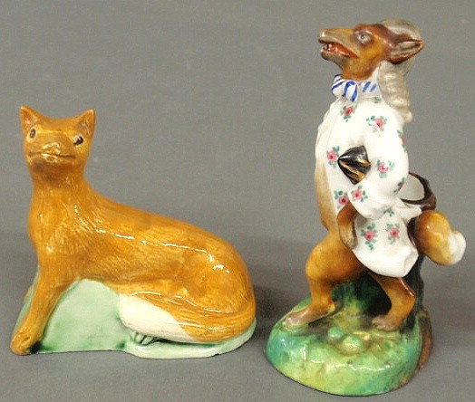 Early Staffordshire porcelain seated fox figure 3: Early Staffordshire porcelain seated fox figure 3.25"h., c.1765, and a late 19th c. German porcelain standing fox toothpick holder 4.5"h.