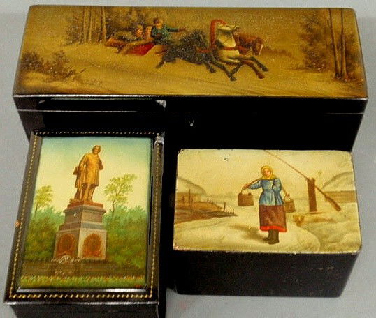 Three 19th c. Russian lacquerware boxes- one with: Three 19th c. Russian lacquerware boxes- one with a lock decorated with two horses and people in an open sleigh and the interior with marks 4"h., one decorated with a statue of a man and the interior