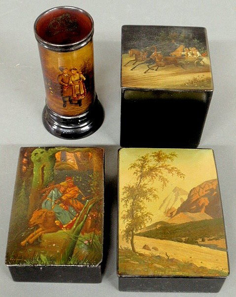 Four 19th c. Russian lacquerware decorated pieces: Four 19th c. Russian lacquerware decorated pieces- box decorated with a mountain scene, box decorated with a man and woman riding a wolf 2"h., tea caddy decorated with three horses and people in an op