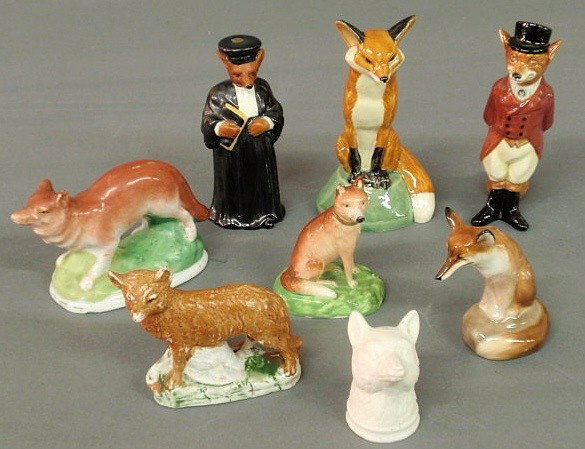 Eight porcelain fox figures including Royal Doult: Eight porcelain fox figures including Royal Doulton, Struck and Royal Worcester, tallest 5"h.
