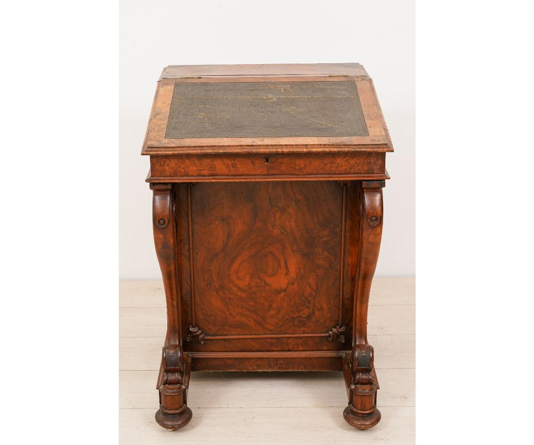 ENGLISH DAVENPORT DESK: English burled walnut davenport desk with satinwood interior and a tooled leather top, circa 1840. 33"h x 22.25"w x 22.5"d