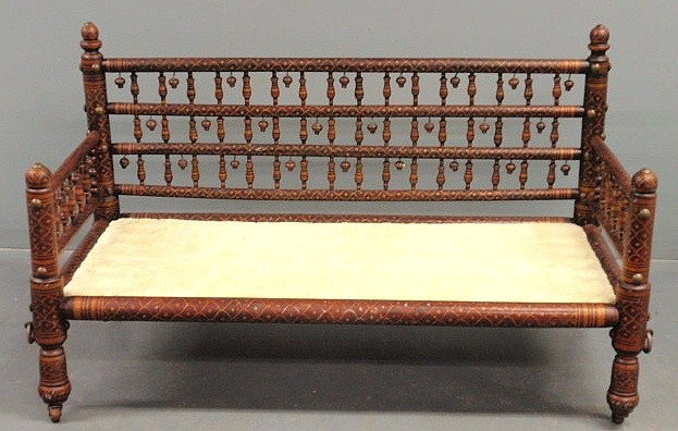 Middle Eastern style settee with a goatskin leath: Middle Eastern style settee with a goatskin leather seat. 32”h.x52”w.x23”d., seat 12”h.