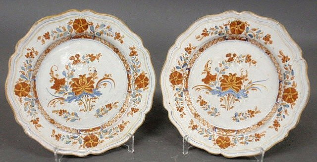 Pair of French faience plates, 18th c., with scal: Pair of French faience plates, 18th c., with scalloped borders and floral decoration. 9.25”diam.