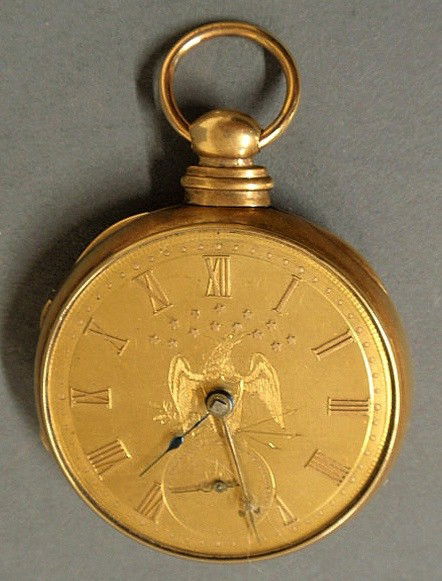 Men’s 18k gold cased pocket watch, the face engra: Men’s 18k gold cased pocket watch, the face engraved with thirteen stars above an American eagle and with a key-wind mechanism. As found. 2”diam.