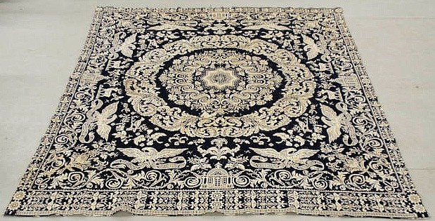 Blue and white jacquard coverlet decorated with e: Blue and white jacquard coverlet decorated with eagles, deer and birds and a center star. 85”x76”