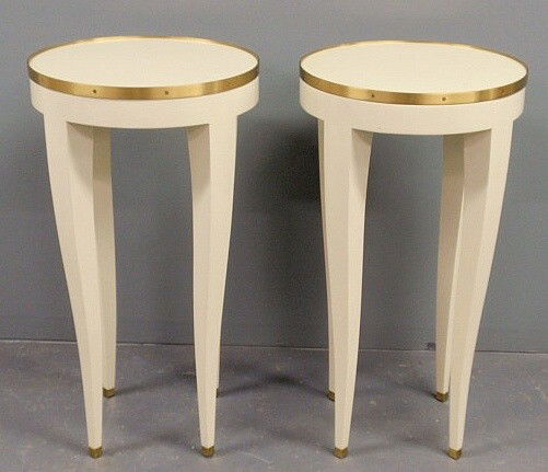 Pair of tall white round top side tables with bra: Pair of tall white round top side tables with brass trim by La Barge, High point, NC. 32”h.x17”diam.