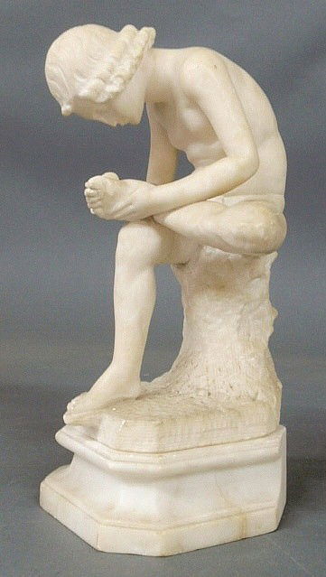 Carved alabaster statue “Boy with Thorn” also cal: Carved alabaster statue “Boy with Thorn” also called “Fedele” or “Spinario” after a Greco-Roman Hellenistic bronze. 12”h.x7”w.